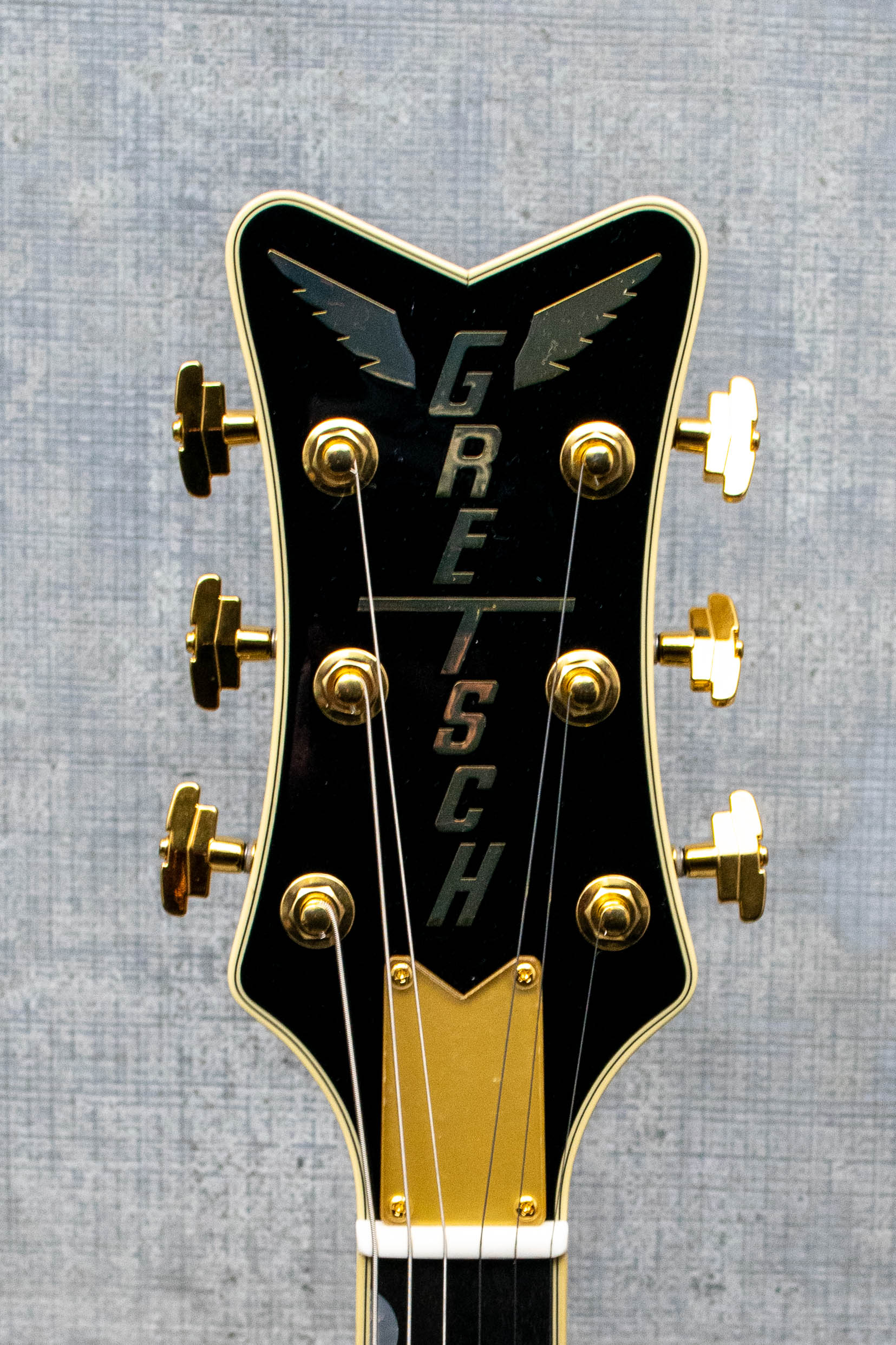 Gretsch Limited Edition Penguin with String-Thru Bigsby Champagne Sparkle